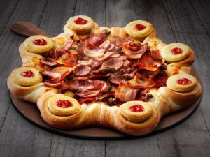 Patties and Pizza Hut describe their new creation, the Four&rsquo;N Twenty Stuffed Crust Pizza, as their 'lovechild'.